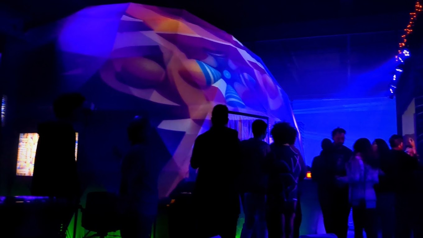 Immersive projection installation with colorful visuals
